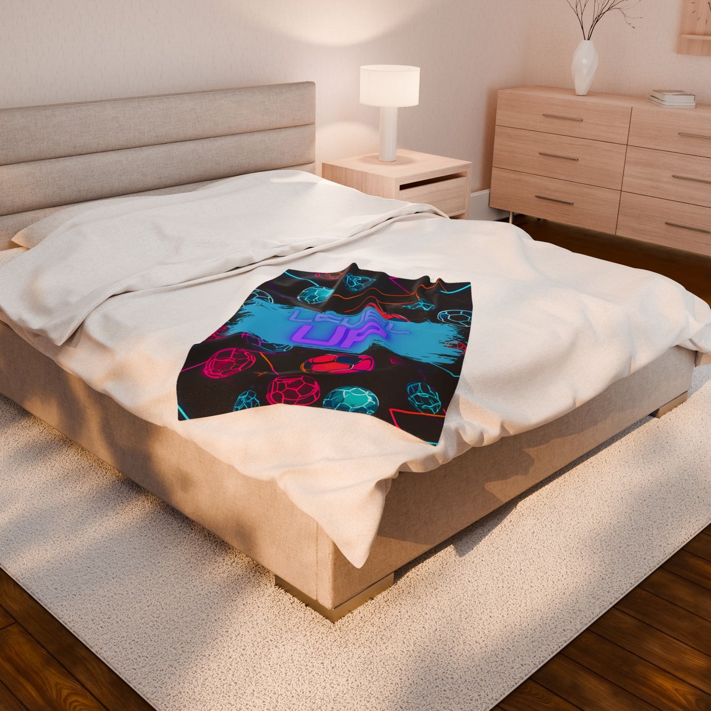 Colorful soccer blanket on a bed in a bedroom setting smaller size