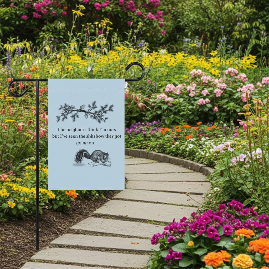 Garden flag with humorous text and illustration in a colorful flower garden.
