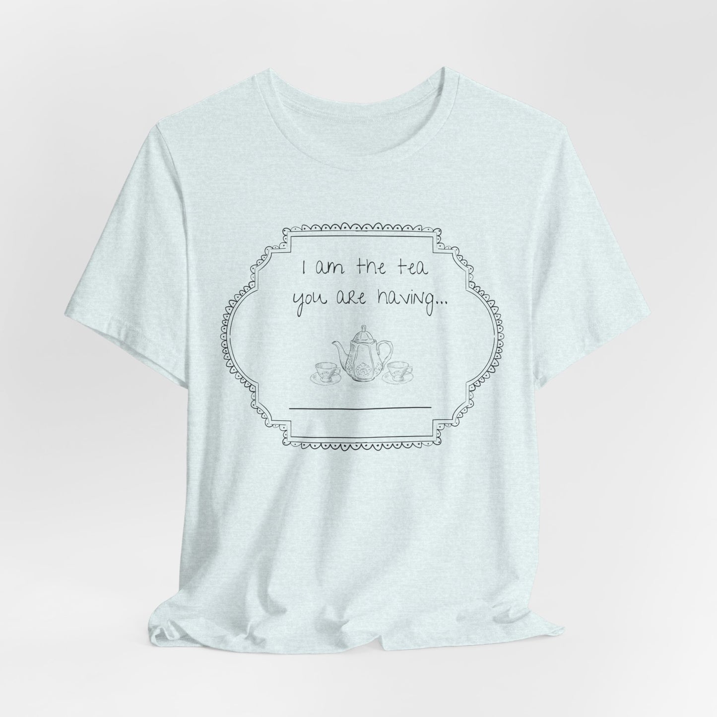 Lightest blue t-shirt with a graphic and text on a light gray studio background
