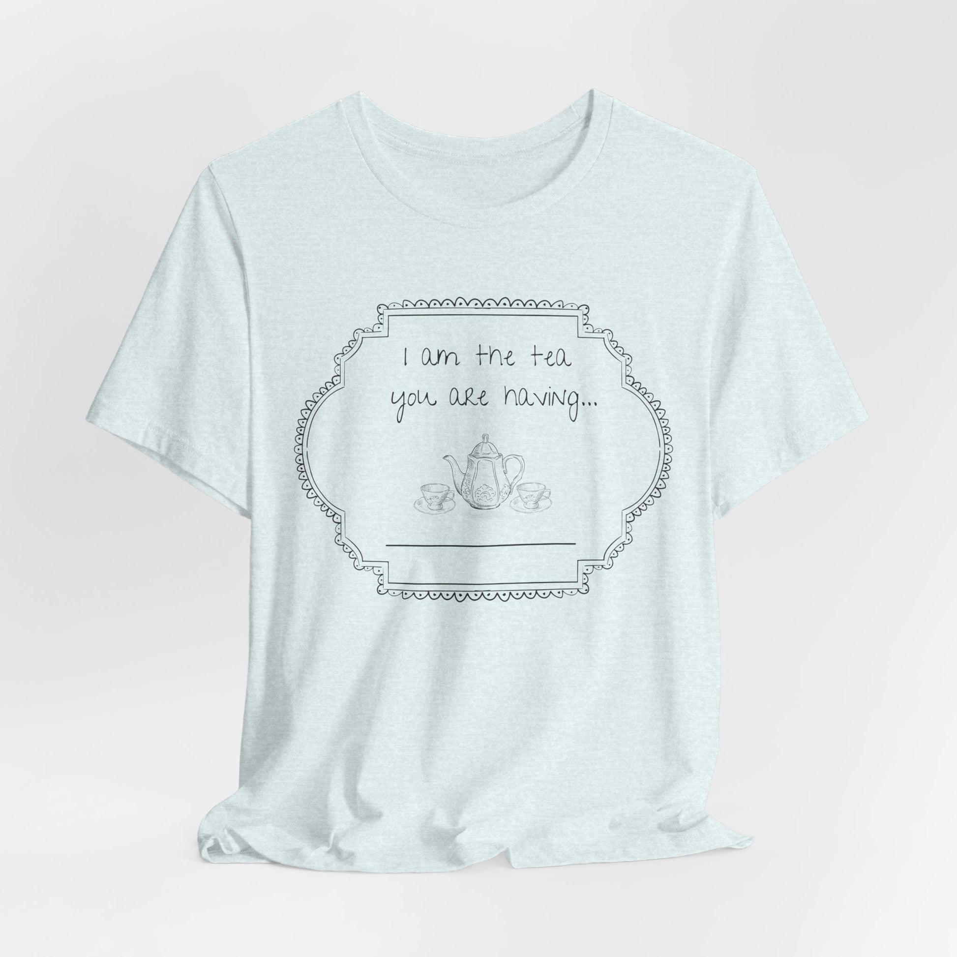 Lightest blue t-shirt with a graphic and text on a light gray studio background
