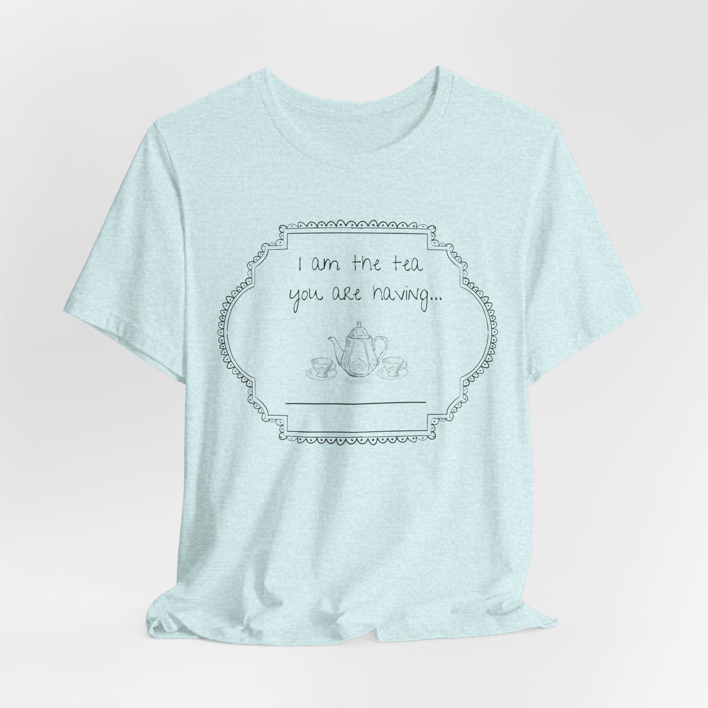 Light blue t-shirt with a graphic design and text on a light gray background