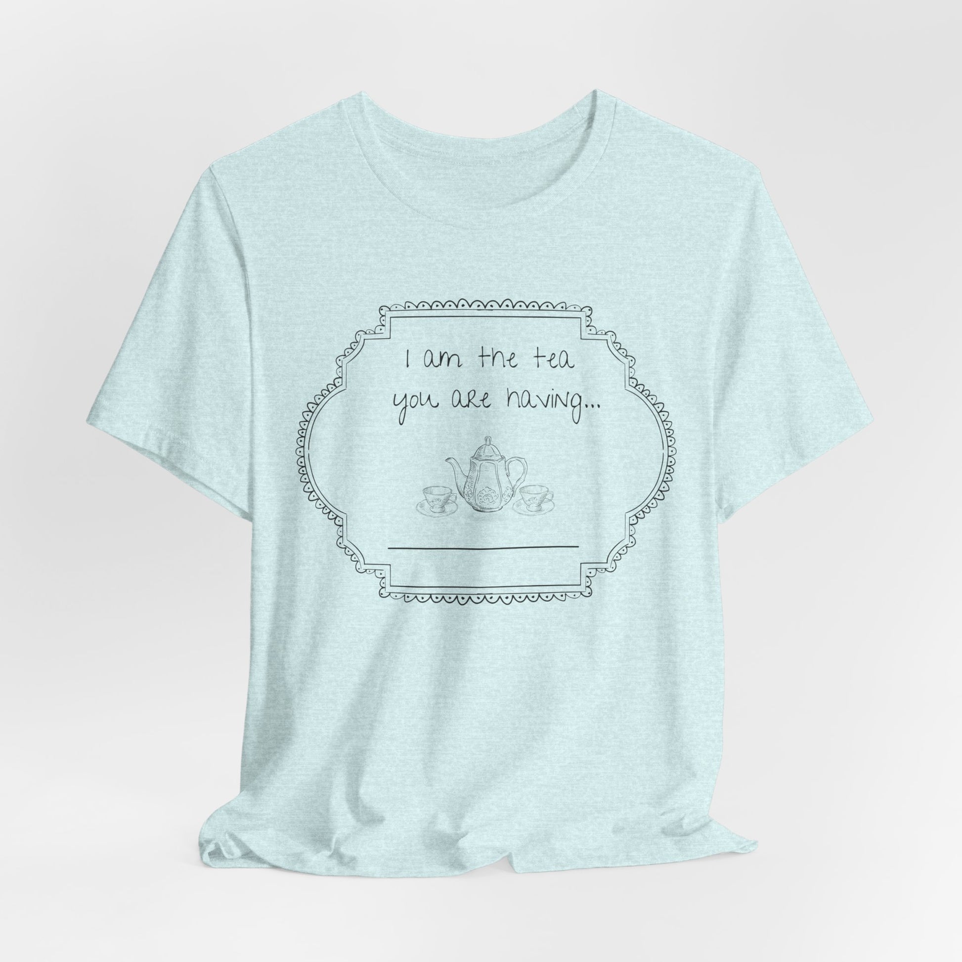 Light blue t-shirt with a graphic design and text on a light gray background