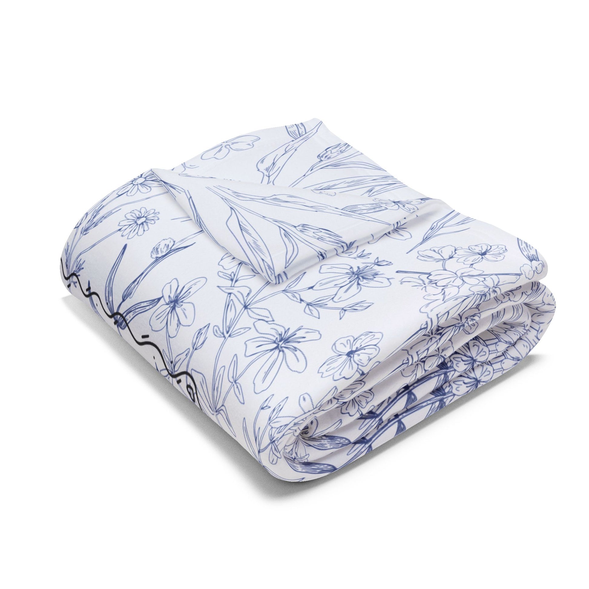 Larger blanket with floral pattern Folded on white background