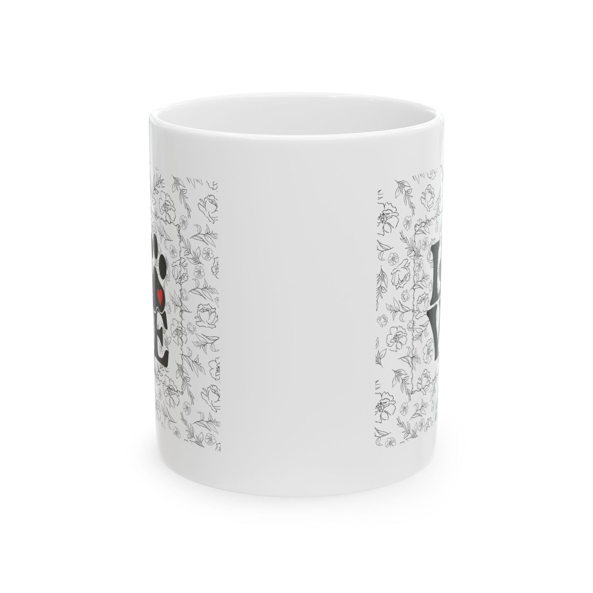 Side view of White mug with black floral pattern on a white background