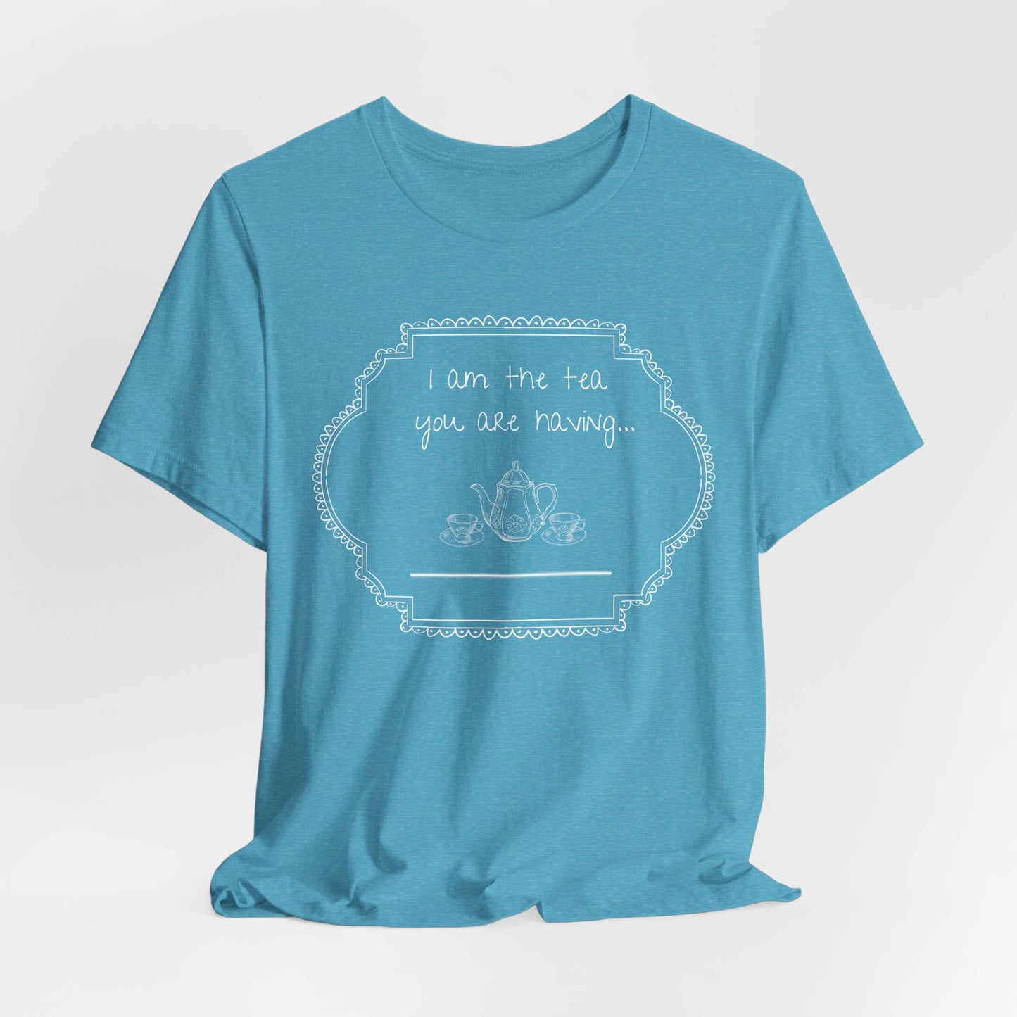 Aqua Blue t-shirt with a white graphic and text on a light gray studio background
