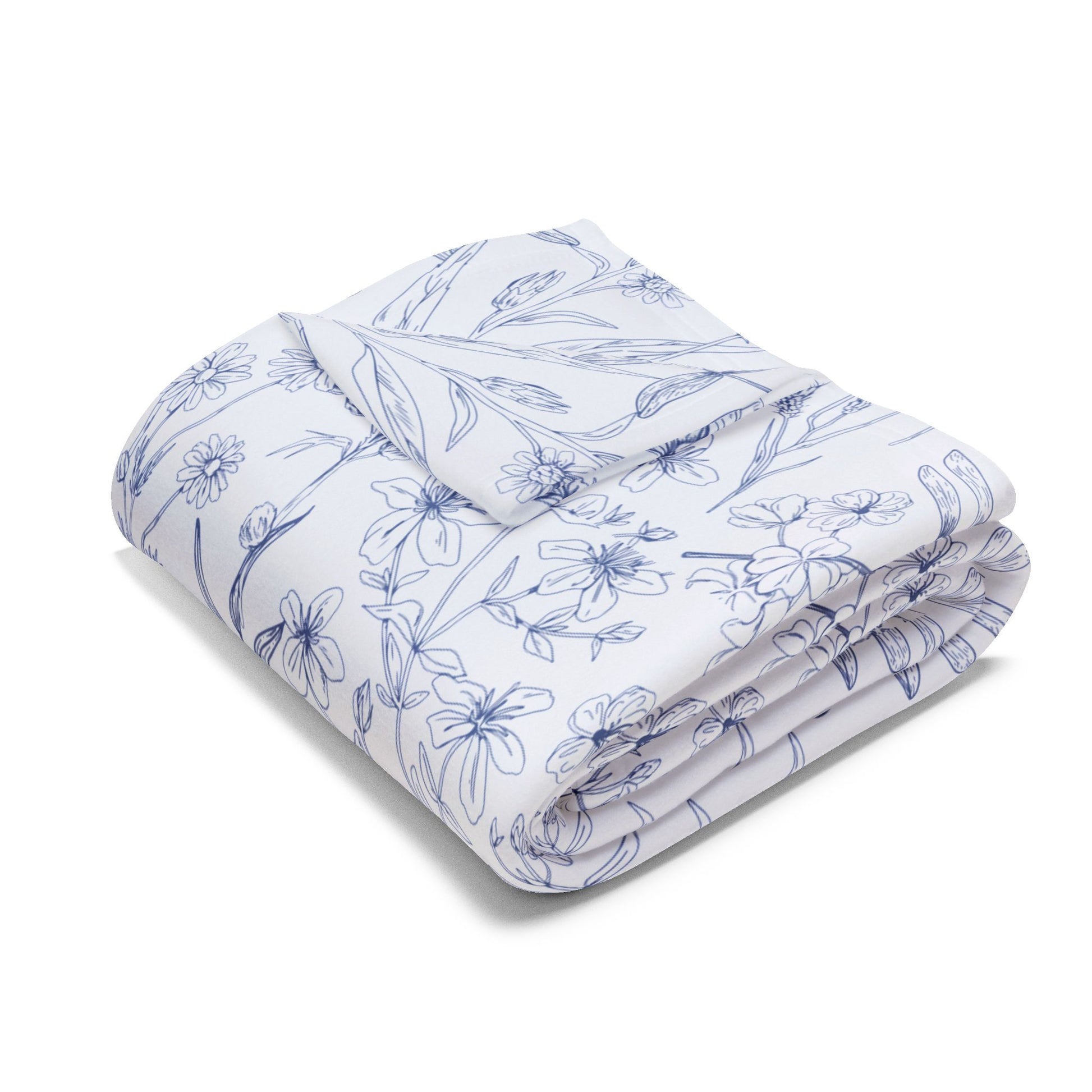 smaller blanket with floral Blue pattern on a white background