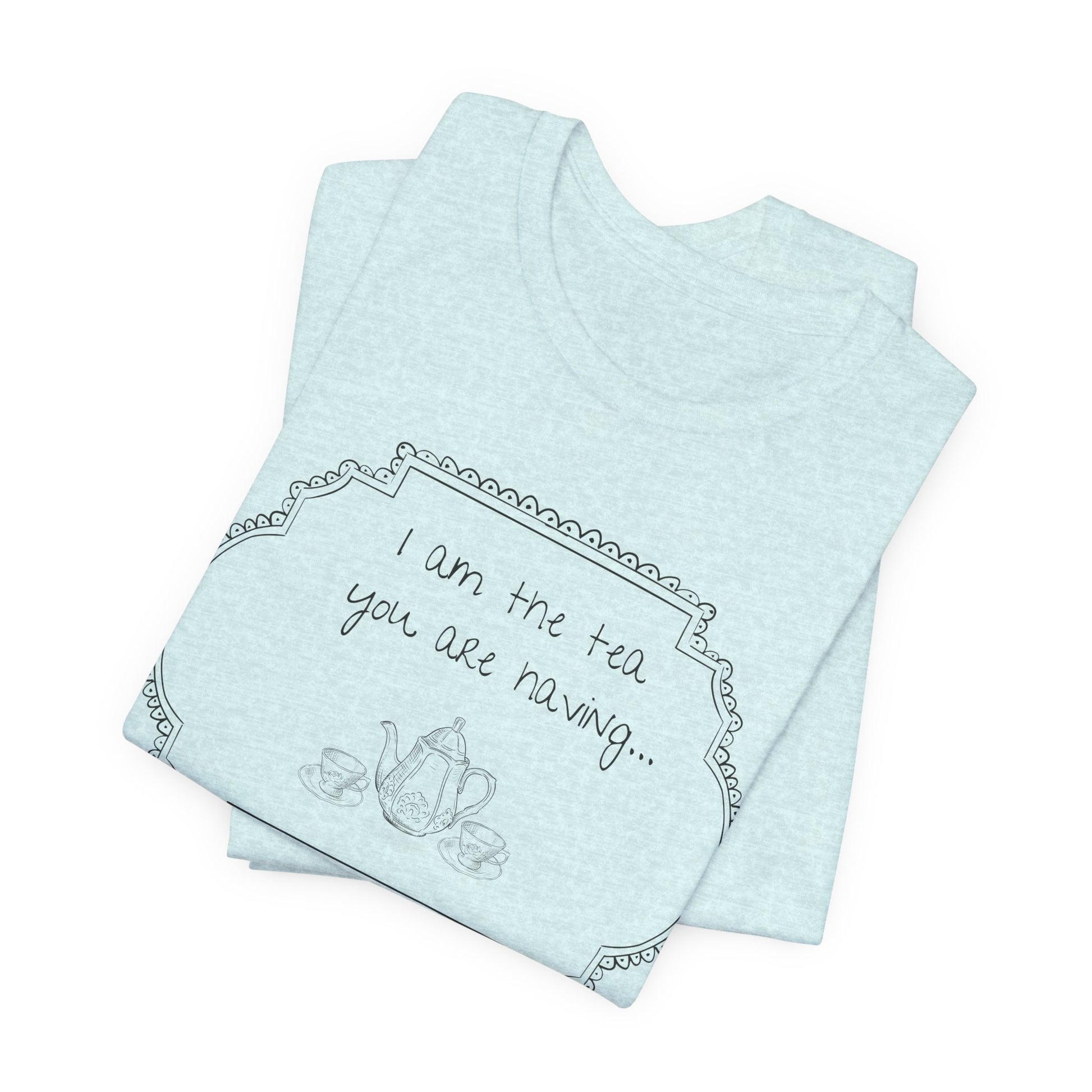 Light blue tee with tea-themed design and text on a white background