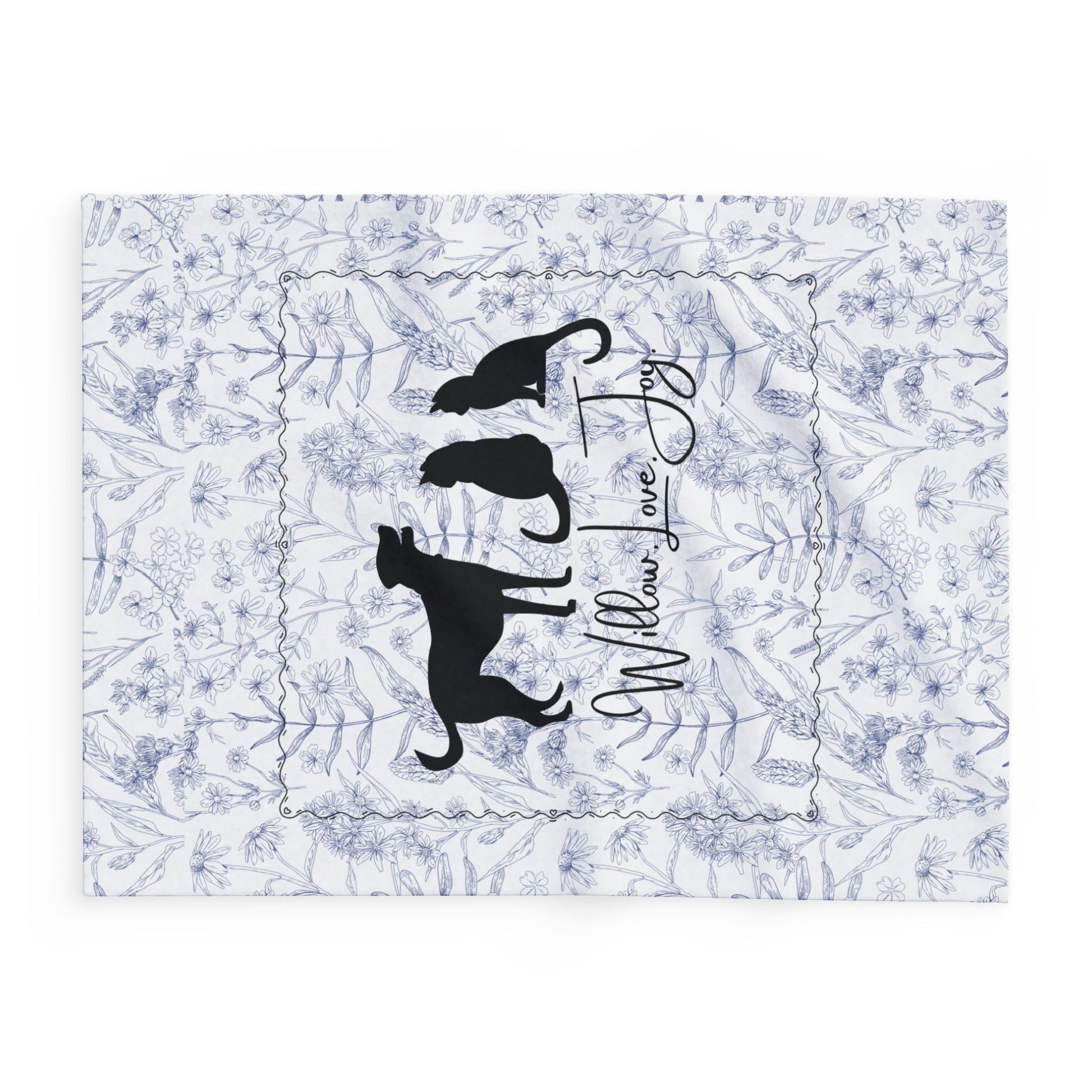 Side view of smaller size Floral Print blanket with a silhouette of a dog and two cats, featuring the text 'Willow Love Joy'. 