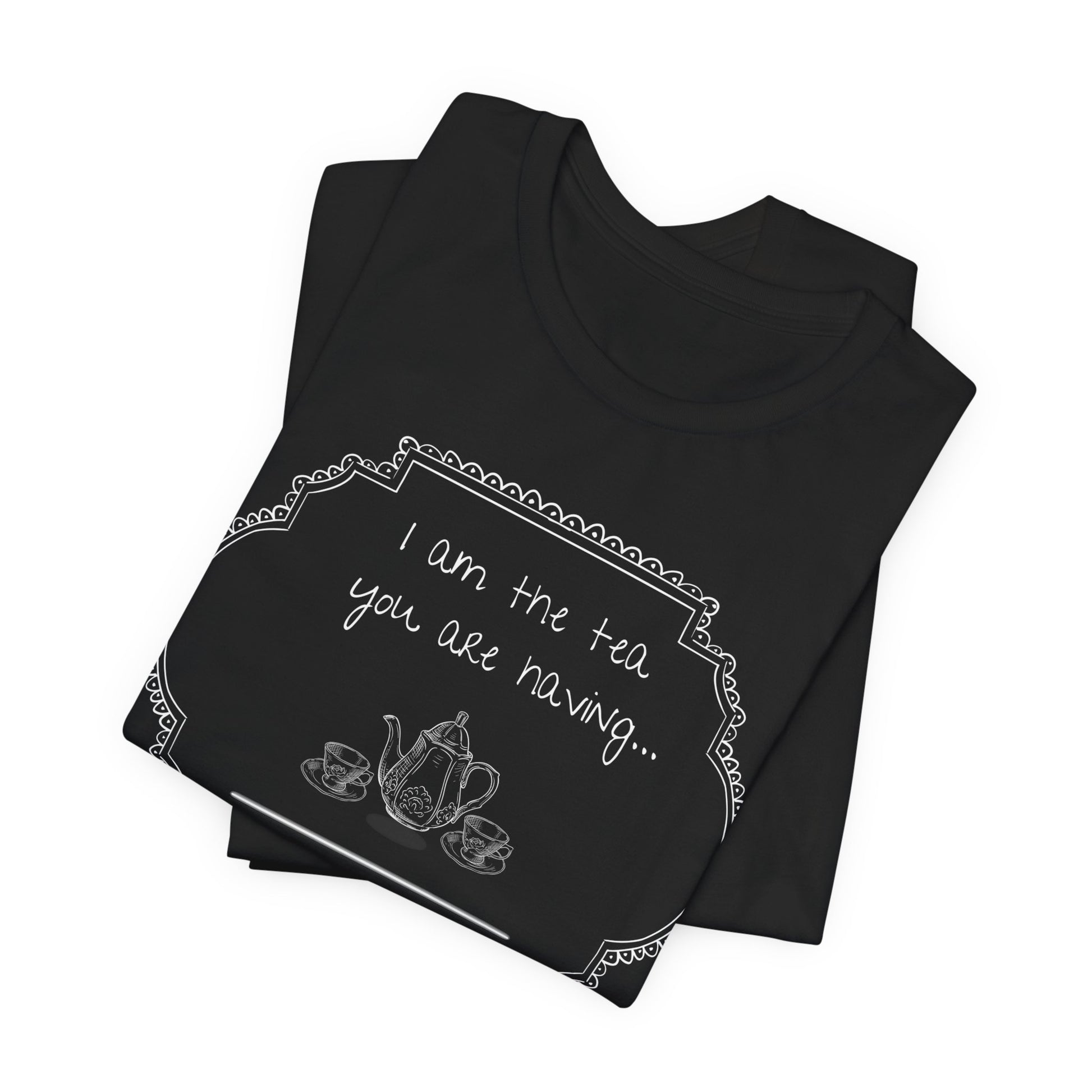 Stack of black t-shirts with white graphic