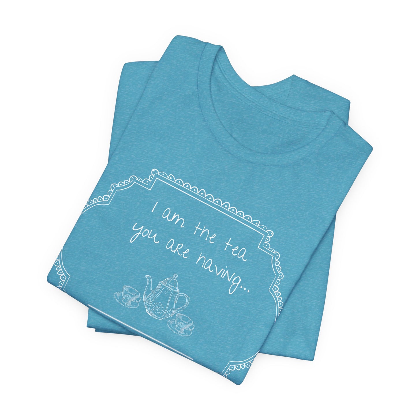 Folded Aqua blue shirt with white text and graphics on a white background